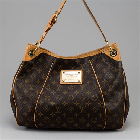 authenticating a louis vuitton bag|authentic louis vuitton inventeur bag.